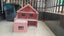 Casa de muñecas en madera color palo de rosa
